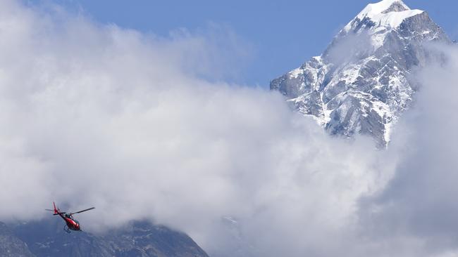 Dwarfed by the mountain: Laing’s Simrik Air B3 helicopter leaving Lukla helipad headed towards Everest Base Camp. Picture: Foxtel.