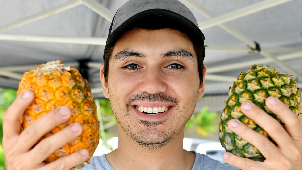 Dario Sarullo with some pineapples that were for sale at the Greater Whitsunday Farmers Market The pineapples were grown on Zelenka's farm at Alligator Creek and Koumala. Picture: Tony Martin