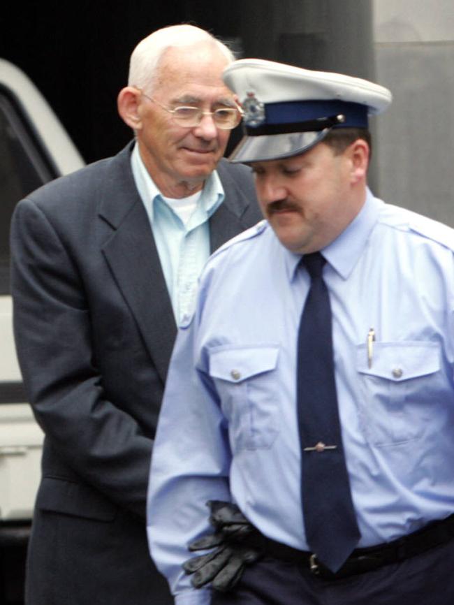 Former Burnie priest and former Marist College teacher Roger Michael Bellemore, 71, arrives with a custodial officer for his appeal hearing.