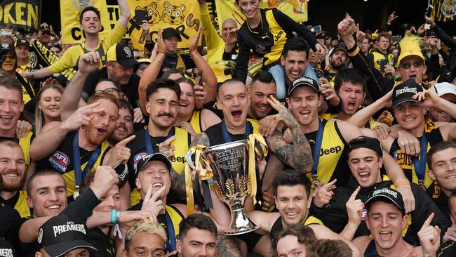 Richmond players with the Tiger Army at the MCG. Picture: AAP Images