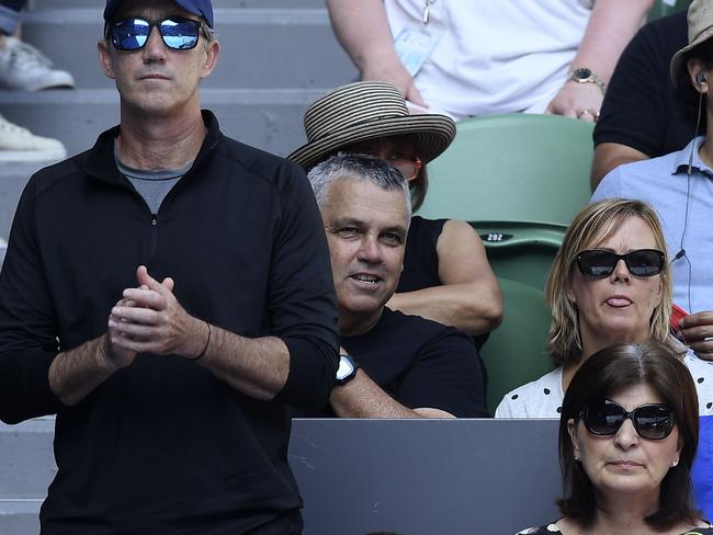 Darren Cahill, coach of Romania's Simona Halep watches her semi-final