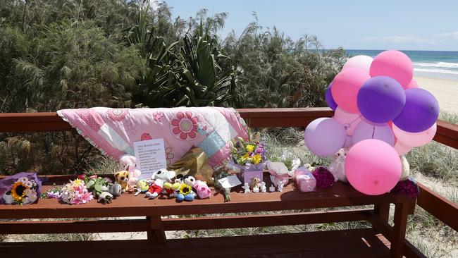 Tributes to the baby that was found dead on the beach in Surfers Paradise near Staghorn Ave. Photo: Tertius Pickard