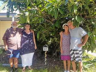 TRADING PLACES: Two sets of Bowen neighbours are facing an uphill battle in legal fees to swap land titles after realising they are living in each others home. Pictured are next door neighbours Eddie Jones, Lyn Jones, Karen Ford and Jeff Ford.