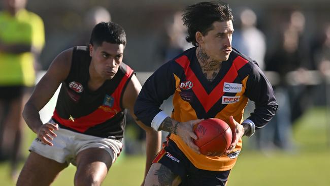 EDFL: East Keilor’s Nick Grabowski scampers away. Picture: Andy Brownbill