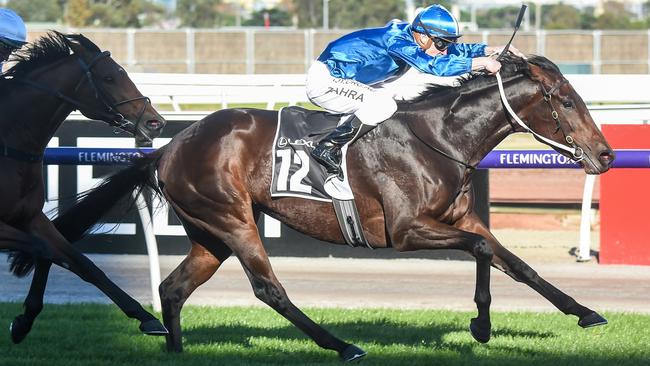 Mark Zahra rides Oceanex to victory in The Andrew Ramsden at Flemington Racecourse.