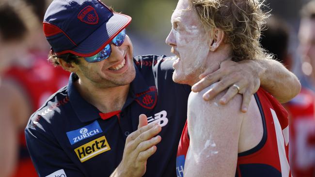 NCA. MELBOURNE, AUSTRALIA. 22nd February, 2025 . North Melbourne vs Melbourne at Arden St Oval.   Christian Petracca gives Clayton Oliver a hug at qtr time    .  Picture: Michael Klein