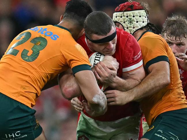 Joseph-Aukuso Suaalii (L) was solid in a quiet game for his side of the field. Picture: Paul Ellis/AFP