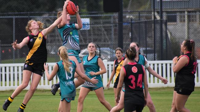 April Devine takes a strong mark for the Coffs Breakers in the match against Grafton. Photo: Green Shoots Marketing