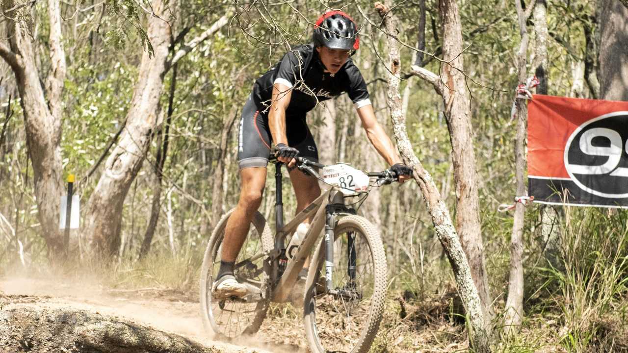 ON PACE: Jacson McNamara shows some speed during the Queensland State Cross Country Mountain Bike titles. Picture: HOMER NEMENZO/YOUNIQUE FOTOS