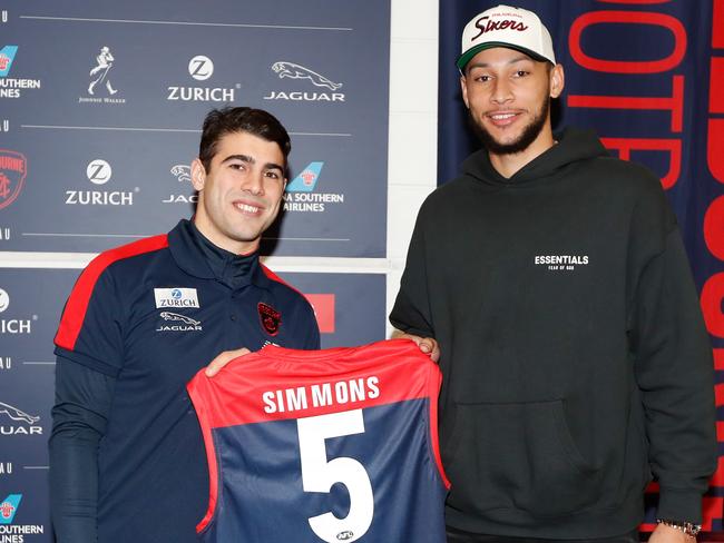 Childhood mates Christian Petracca and Ben Simmons at the Round 21 match between Melbourne and Collingwood. Picture: AFL Photos/Getty Images