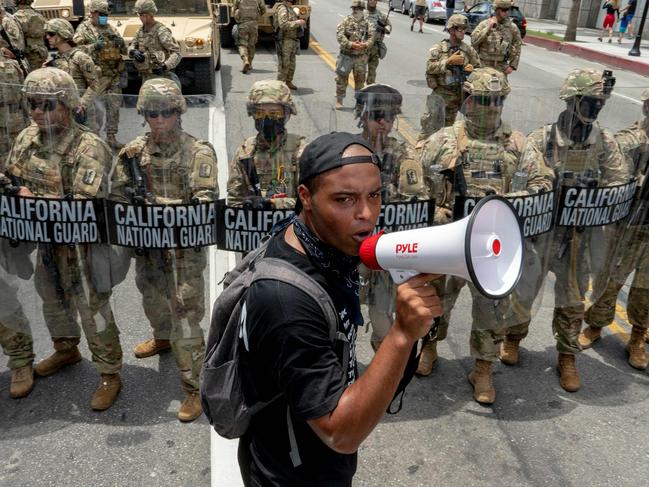 A protester speaks in front of the California National Guard during a demonstration in Los Angeles, California. Picture: AFP