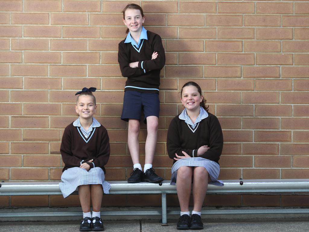 One father was more concerned to learn Mackellar students who wear shorts are “treated as second class citizens.” The fight for shorts has been taken up by many parents and girls – pictured centre in 2019 is St Mark's Lutheran School student Jayla Sanders, aged just nine at the time, who successfully lobbied for summer shorts. Picture: Tait Schmaal