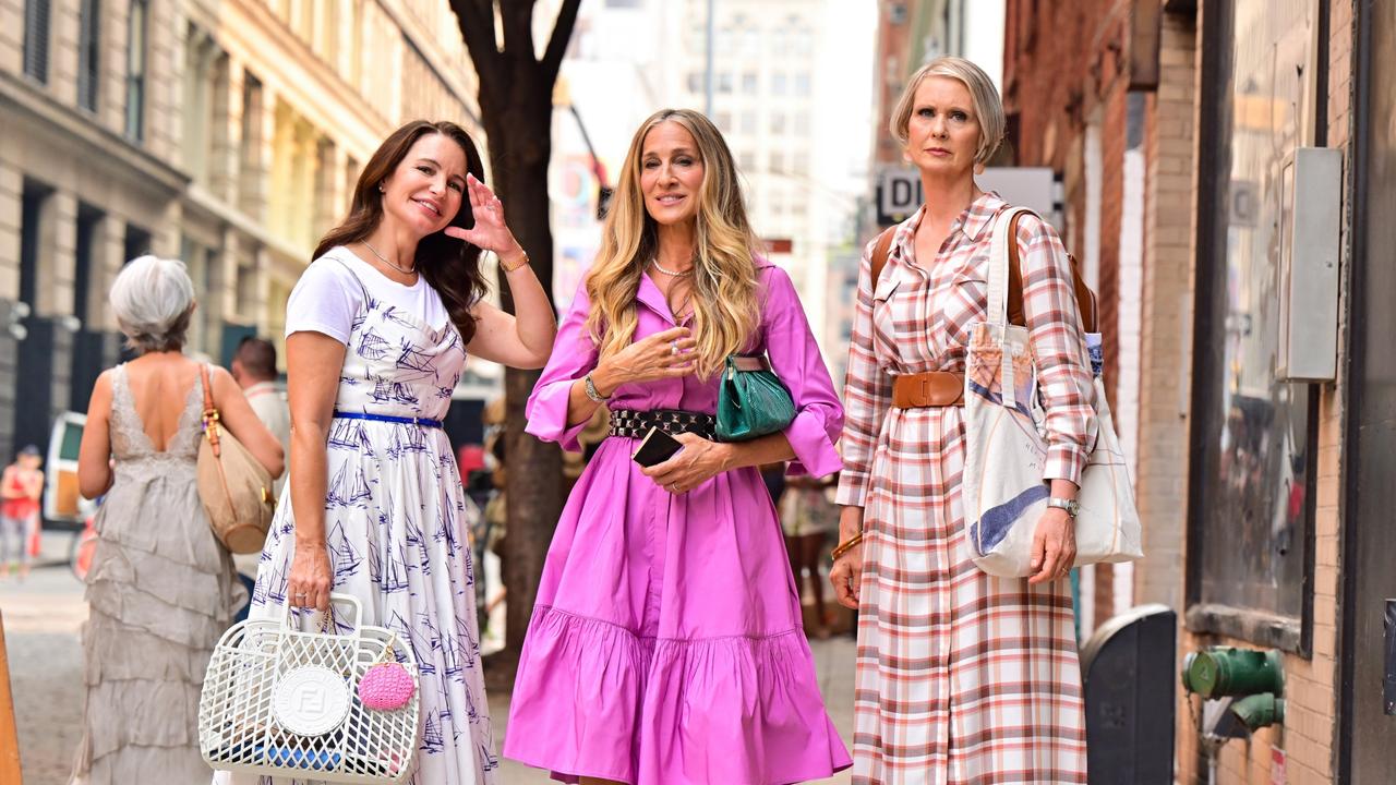 L-R: Kristin Davis, Sarah Jessica Parker and Cynthia Nixon will return for And Just Like That..., with Kim Cattrall absent. Picture: James Devaney/GC Images