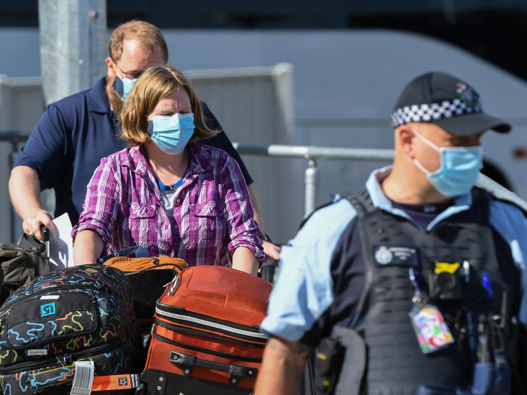 Passengers escorted at Sydney International Airport yesterday are now free to go. Picture: James D Morgan/Getty Images