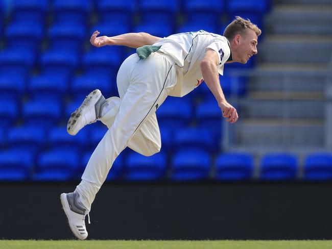 Riley Meredith of the Tigers bowls on day three of the Round 6 Sheffield Shield match between Tasmania and Queensland at Blundstone Arena. Picture: AAP IMAGE/ROB BLAKERS