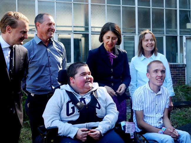 NSW Premier Gladys Berejiklian and Member for Manly James Griffin talk with the families of Scott Green, 21, and Matthew Van Hoek, 22, at the site of Australia's first palliative care hospice for young people living with an incurable illness. Picture: NCA NewsWire / Nikki Short