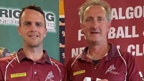 Traralgon recruit Tom Schneider and club president Kevin Foley.