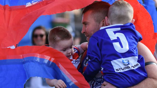 Trent Scannell runs through the banner for his 300th game. Picture: Nathan William Media