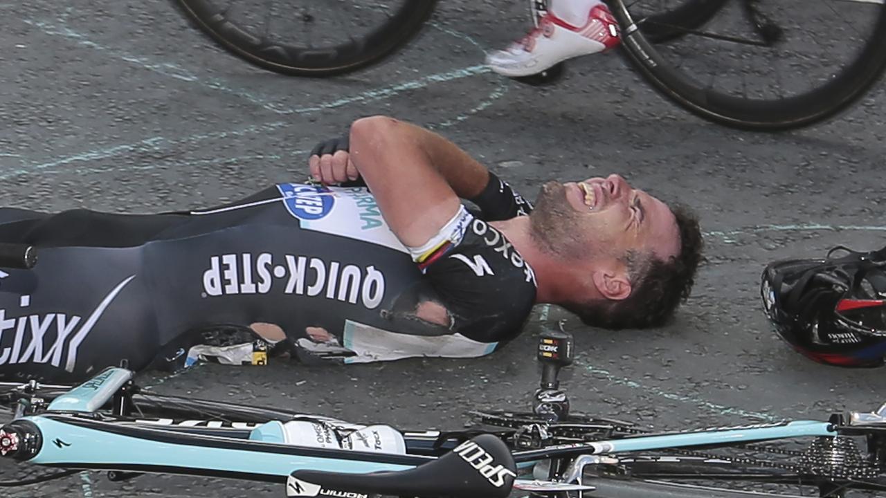 Britain's sprinter Mark Cavendish grimaces after he crashed in the last kilometers of the first stage of the Tour de France cycling race over 190.5 kilometers (118.4 miles) with start in Leeds and finish in Harrogate, England, Saturday, July 5, 2014. (AP Photo/Fred Mons, Pool)