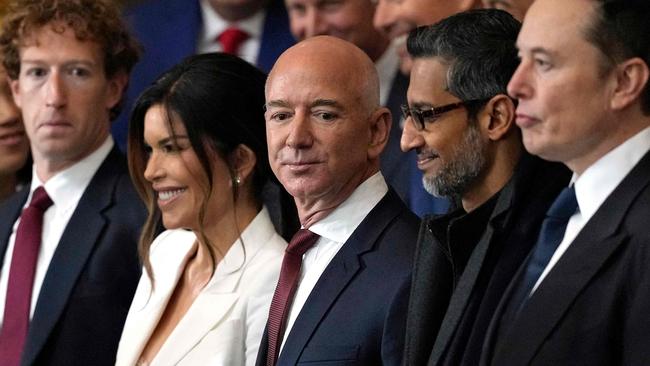 TOPSHOT - (L-R) CEO of Meta Mark Zuckerberg, Lauren Sanchez, US businessman Jeff Bezos, CEO of Alphabet Inc and Google Sundar Pichai and Teska and SpaceX CEO Elon Musk attend the inauguration ceremony where Donald Trump will sworn in as the 47th US President in the US Capitol Rotunda in Washington, DC, on January 20, 2025. (Photo by Julia Demaree Nikhinson / POOL / AFP)