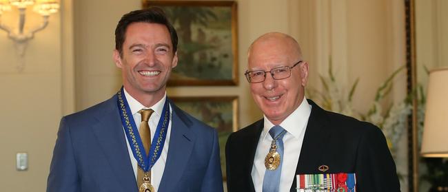 Honoured. Hugh Jackman was appointed a Companion in the General Division by the Governor-general David Hurley, during an investiture ceremony at Government House in Canberra. Picture: Kym Smith