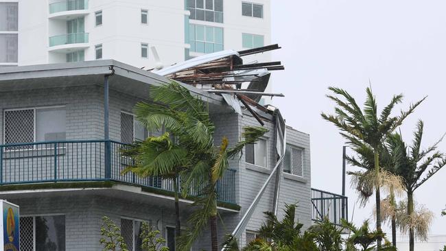 The fierce winds were enough to tear roofs from buildings at Labrador on the Gold Coast. Picture: NewsWire/Tertius Pickard