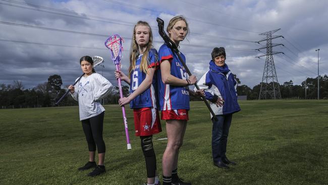 Amanda Hollenkamp, Ella Jameson, Poppy Ashby and Camberwell Lacrosse Club vice president Jennie Easson say fear they will be most affected. Picture: Wayne Taylor