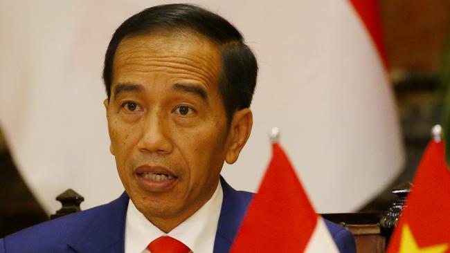 Indonesian President Joko Widodo, delivers his address following signing ceremony with Vietnamese counterpart Tran Dai Quang (not in picture) at the Presidential Palace in Hanoi on September 11, 2018 at the sideline of the World Economic Forum on ASEAN. (Photo by Bullit Marquez / POOL / AFP)