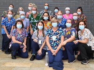 Lismore Base Hospital emergency unit staff in Fun Friday Scrub Club tops donated by Infectious Clothing as a mental health initiative for healthcare workers. Back Row (L-R): Kathy Macnamara , Emma-Jane Davies (NUM 3 ED), Alison Gibson, Kath Shaw, Alice Lehmkuhl, Andy Chandler, Leesa Simmons, Hannah Short, Tanya Yager, Donna Kylstra, Lydia BolziccoFront Row (L-R): Stephanie Emery, Sally Thompson, Nicole Eather, Jenny Thompson, Lee Haslau, Carli Malcolm, Olivia Ledingham.