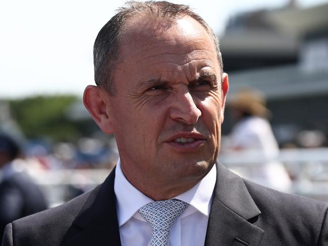 SYDNEY, AUSTRALIA - JANUARY 25: Trainer Chris Waller celebrates after  Tommy Berry riding Political Debate  win Race 5 Drinkwise during Sydney Racing at Royal Randwick Racecourse on January 25, 2025 in Sydney, Australia. (Photo by Jeremy Ng/Getty Images)