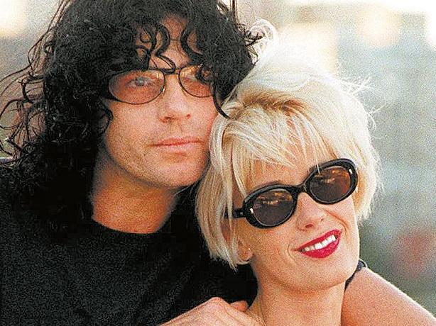 Undated: Singer Michael Hutchence from band INXS and partner Paula Yates with their baby Heavenly Hiraani Tiger Lily in Sydney.