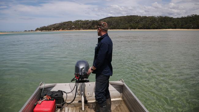 Wapengo Oyster Farm manager John Blankenstein on the job.