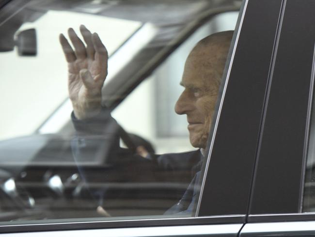 Britain's Prince Philip waves as he leaves the King Edward VII Hospital. Picture: APh