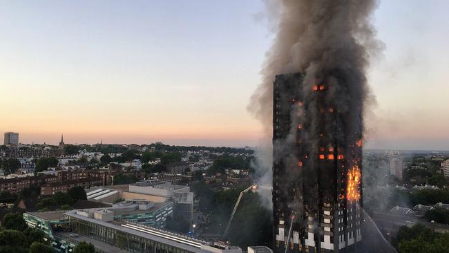 This image by London resident Natalie Oxford early on June 14, 2017 shows flames and smoke coming from the 27-storey block of flats after a fire broke out in west London.