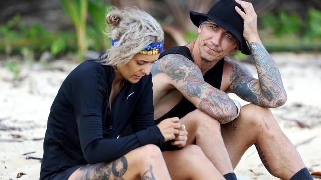 Making friends: Hope bonds with Mat Rogers on the beach. Picture: Ten Network