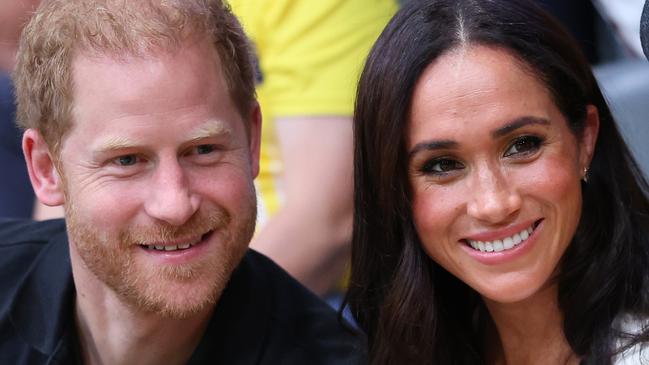 DUESSELDORF, GERMANY - SEPTEMBER 13: Prince Harry, Duke of Sussex and Meghan, Duchess of Sussex  pose for a photograph as they attend the Wheelchair Basketball preliminary match between Ukraine and Australia during day four of the Invictus Games DÃÂ¼sseldorf 2023 on September 13, 2023 in Duesseldorf, Germany. (Photo by Chris Jackson/Getty Images for the Invictus Games Foundation)