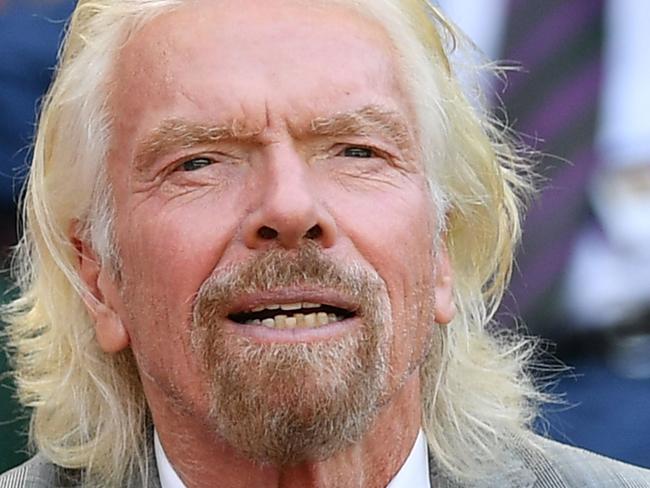 British businessman Richard Branson sits in the Royal Box above Centre Court as Ukraine's Elina Svitolina plays  against Romania's Simona Halep during their women's singles semi-final match on day ten of the 2019 Wimbledon Championships at The All England Lawn Tennis Club in Wimbledon, southwest London, on July 11, 2019. (Photo by Daniel LEAL-OLIVAS / AFP) / RESTRICTED TO EDITORIAL USE