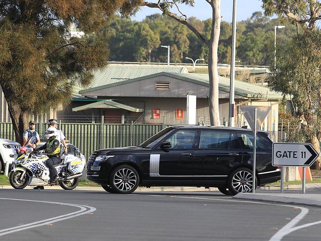 The royal couple leaving Sydney airport after landing from Tonga.