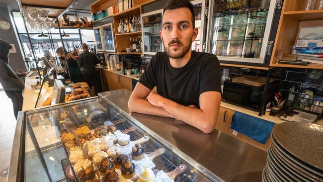 The reopening of cafes and restaurants will be allowed under strict density and patron caps. Picture: Tony Gough