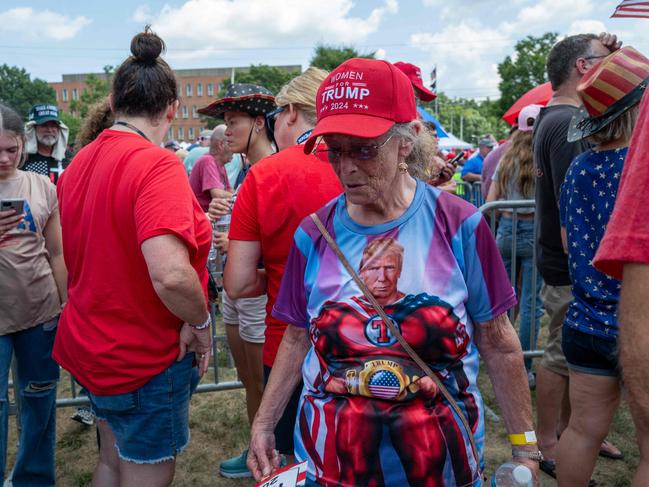 People line up to see Republican presidential nominee, former US President Donald Trump speak on July 31, 2024 in Harrisburg, Pennsylvania. Trump is returning to Pennsylvania for the first time since the assassination attempt. Polls currently show a close race with Democratic presidential candidate, US Vice President Kamala Harris. Spencer Platt/Getty Images/AFP (Photo by SPENCER PLATT / GETTY IMAGES NORTH AMERICA / Getty Images via AFP)