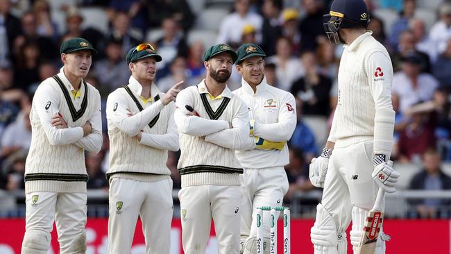 Australia’s players react to a successful review for Craig Overton. Picture: AP