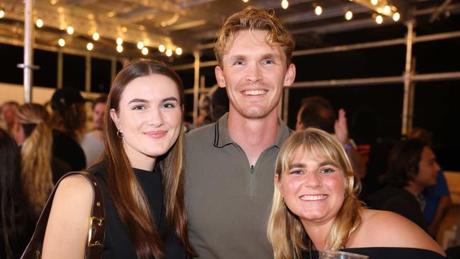 Melina Issler, Eskil Aasvold and Lucy Charchalis at the WSL Gold Coast Pro 2025 after party at Burleigh Pavilion for Gold Coast at Large. Picture, Portia Large.