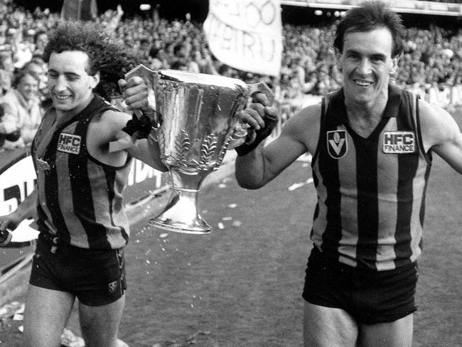 Terry Wallace with Hawks teammate John Platten and the 1986 premiership.