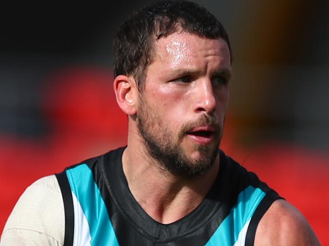 GOLD COAST, AUSTRALIA - JUNE 27: Travis Boak of the Power in action during the round 4 AFL match between the Port Adelaide Power and the West Coast Eagles at Metricon Stadium on June 27, 2020 in Gold Coast, Australia. (Photo by Chris Hyde/Getty Images)