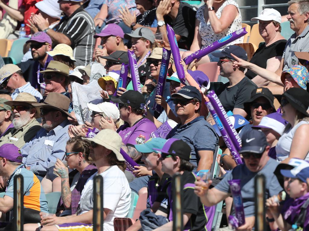 Fans enjoying the hot weather at the Big Bash match between the Hurricanes and Melbourne Stars at Blundstone Arena on Christmas Eve. Picture: LUKE BOWDEN