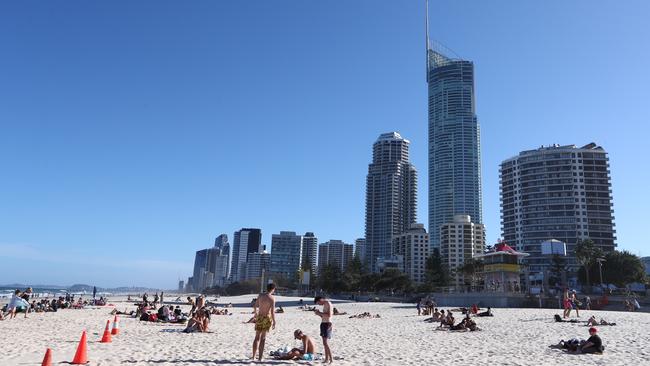 Crowds return to Surfers Paradise beach. Photograph : Jason O'Brien.