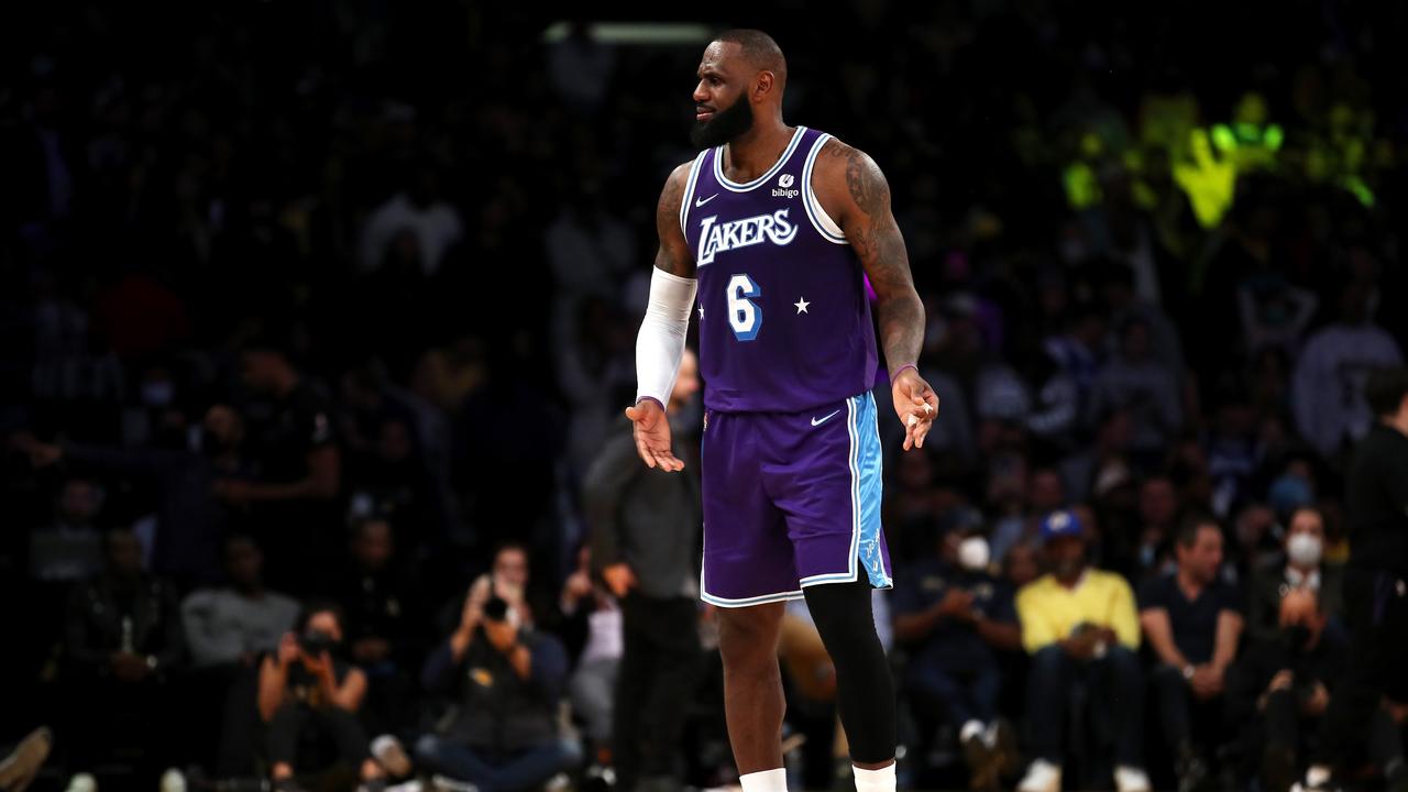 LOS ANGELES, CALIFORNIA - FEBRUARY 25: LeBron James #6 of the Los Angeles Lakers reacts to a play during the fourth quarter against the Los Angeles Clippers at Crypto.com Arena on February 25, 2022 in Los Angeles, California. NOTE TO USER: User expressly acknowledges and agrees that, by downloading and or using this Photograph, user is consenting to the terms and conditions of the Getty Images License Agreement. Katelyn Mulcahy/Getty Images/AFP == FOR NEWSPAPERS, INTERNET, TELCOS &amp; TELEVISION USE ONLY ==