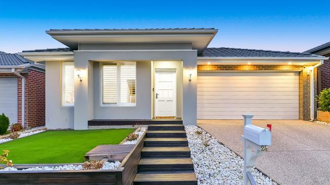 24 Anvil Way, Clyde North, is a four-bedroom house with an $800,000-$850,000 price guide. The suburb is popular with first-home buyers and families.