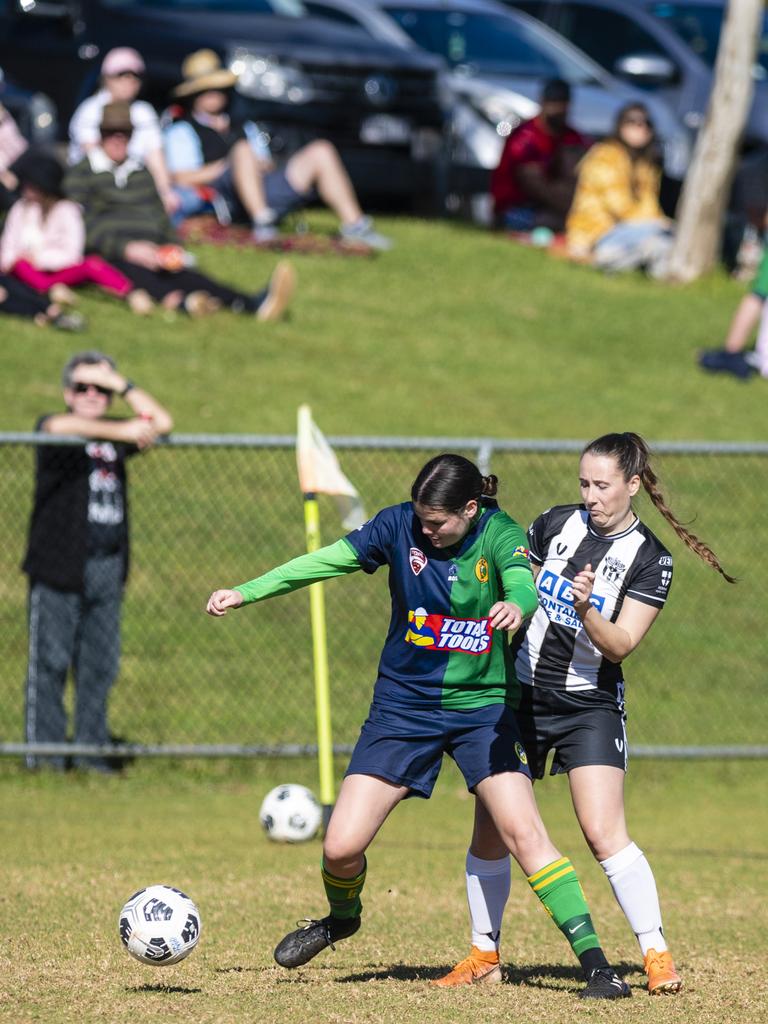 Bridget Peden (left) of Highfields and Lana Styler of Willowburn in FQPL Women Darling Downs Presidents Cup football at West Wanderers, Sunday, July 24, 2022. Picture: Kevin Farmer