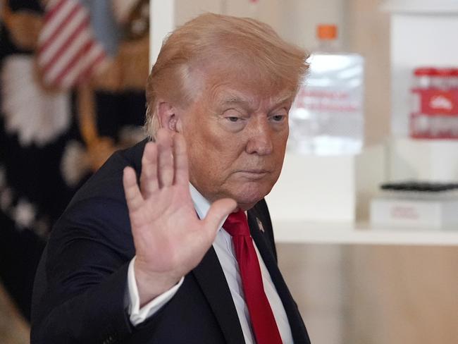 President Donald Trump waves after speaking about investing in America in the Cross Hall of the White House, Wednesday, April 30, 2025, in Washington. (AP Photo/Alex Brandon)